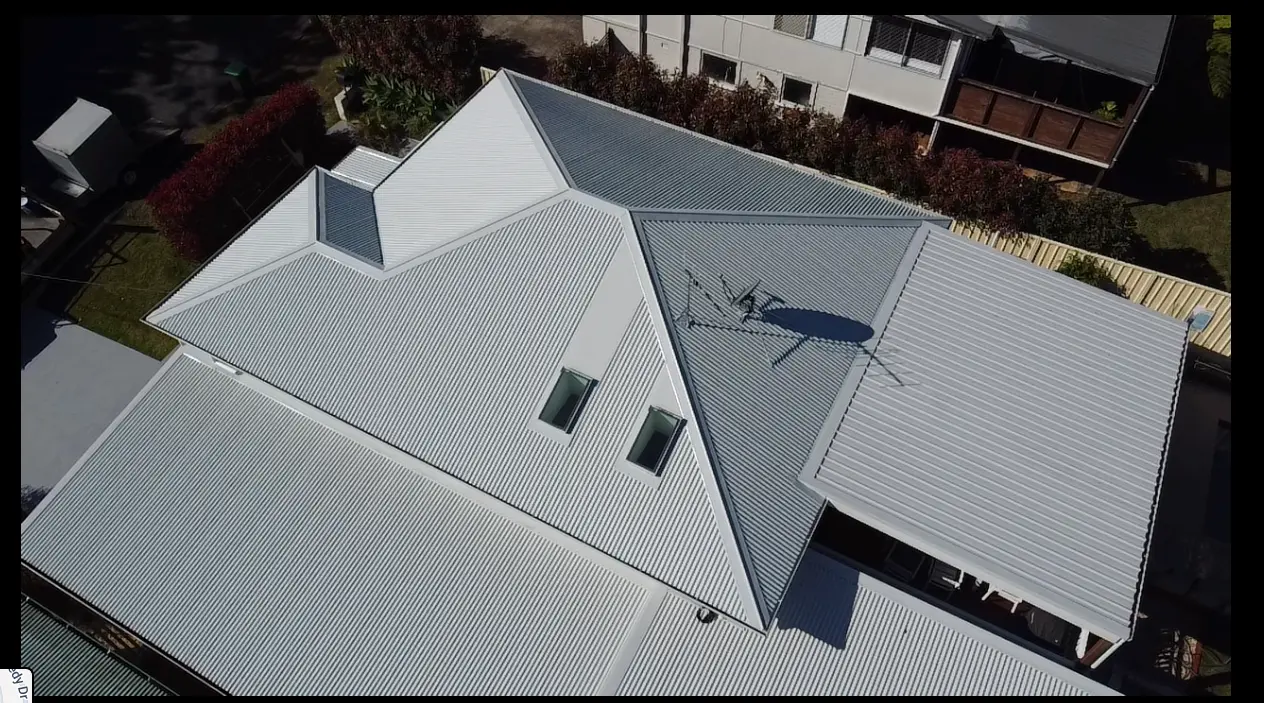 Beau South roofing team installing a Colorbond roof in Port Macquarie